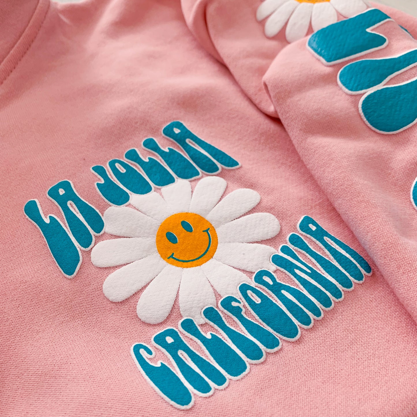 Surf Diva Daisy Smiley WOMEN'S HOODIE - pink